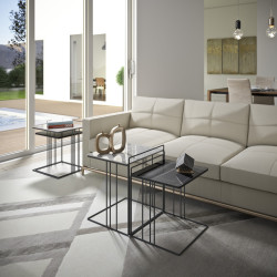 The set of two Piramide Double coffee tables come with a black metal structure and a stoneware top