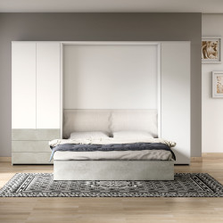 The bed can be integrated with the wardrobes of the collection