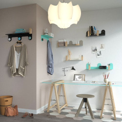 The narrow floating shelves are perfect in a study or work corner